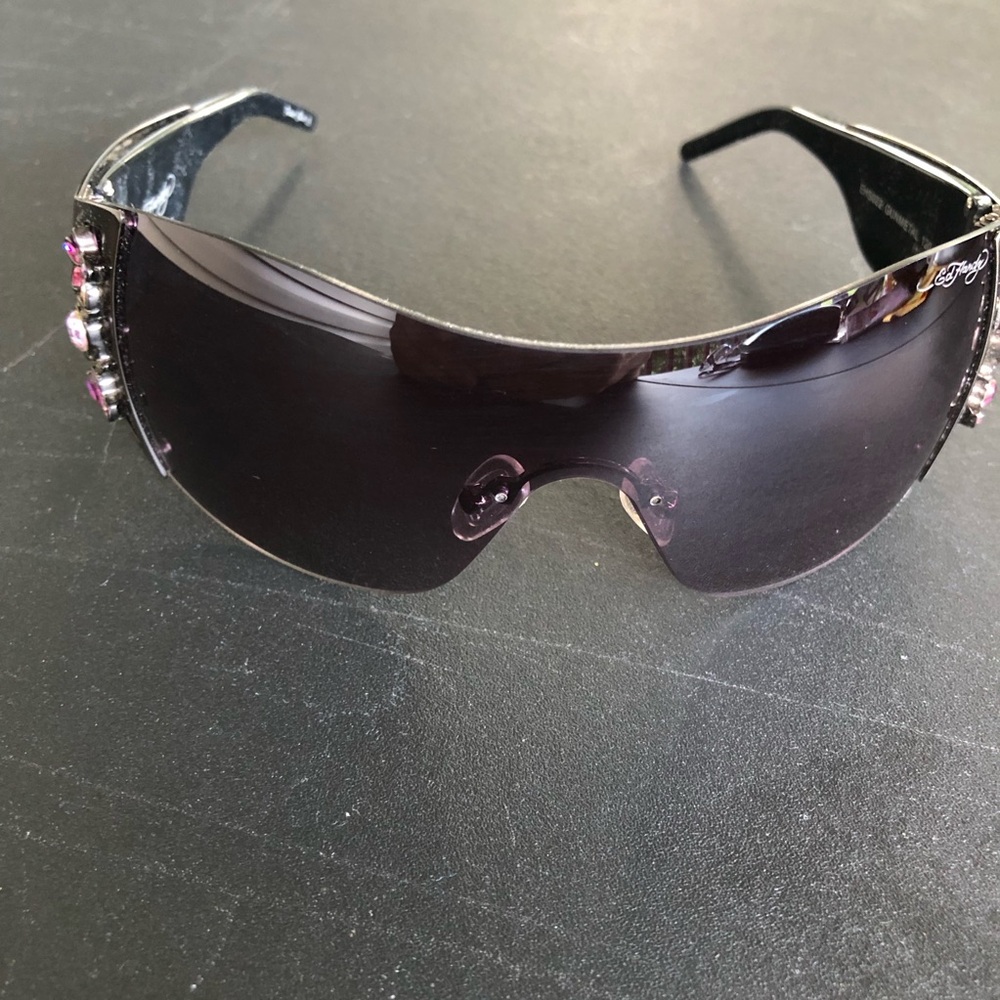 Ed Hardy skulls and cherry blossoms nonprescription shield style sunglasses.